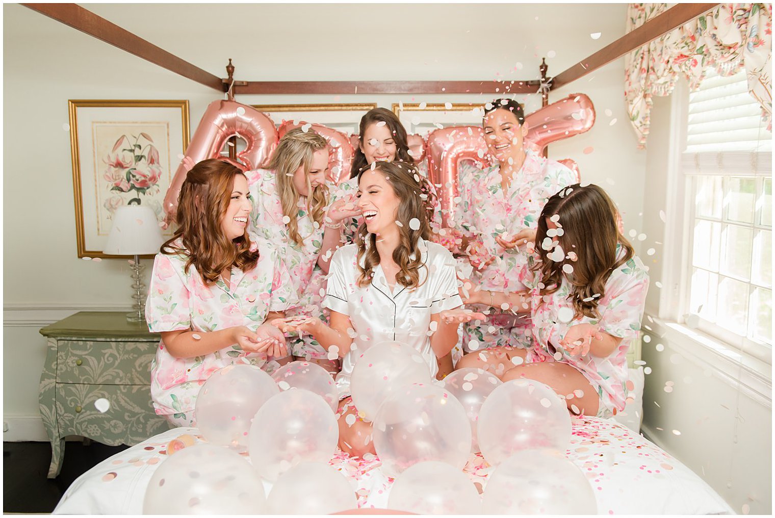 bride and bridesmaids toss confetti in New Jersey