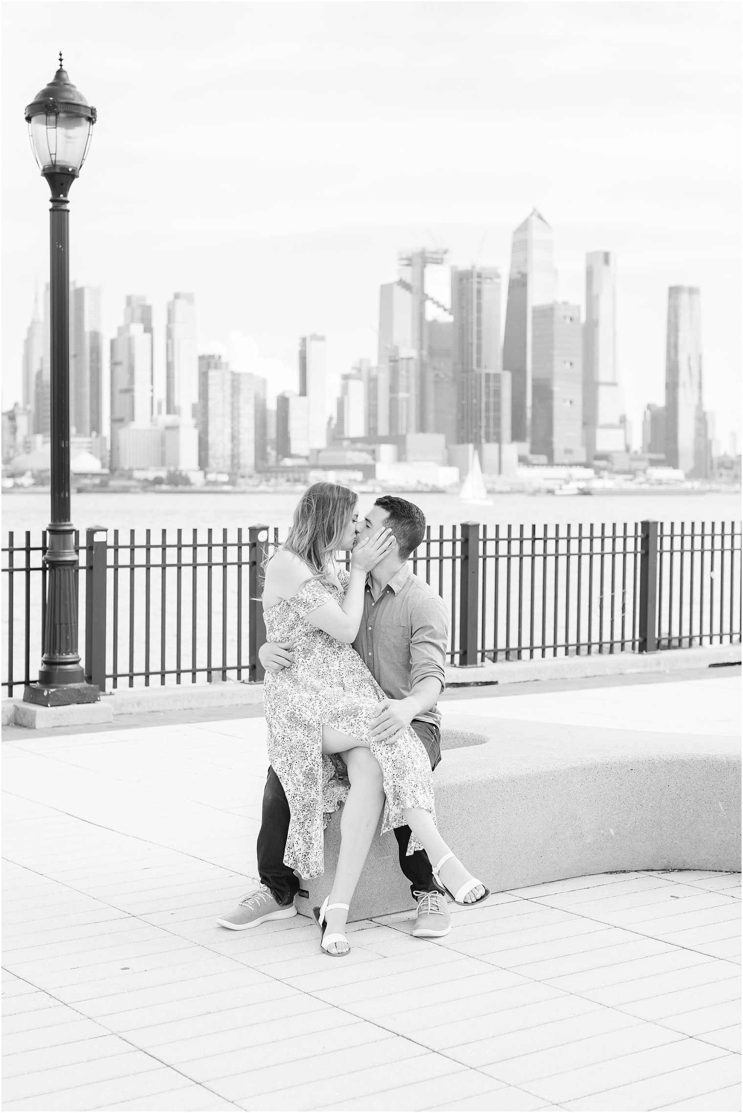 engaged couple kisses in park during NJ engagement session