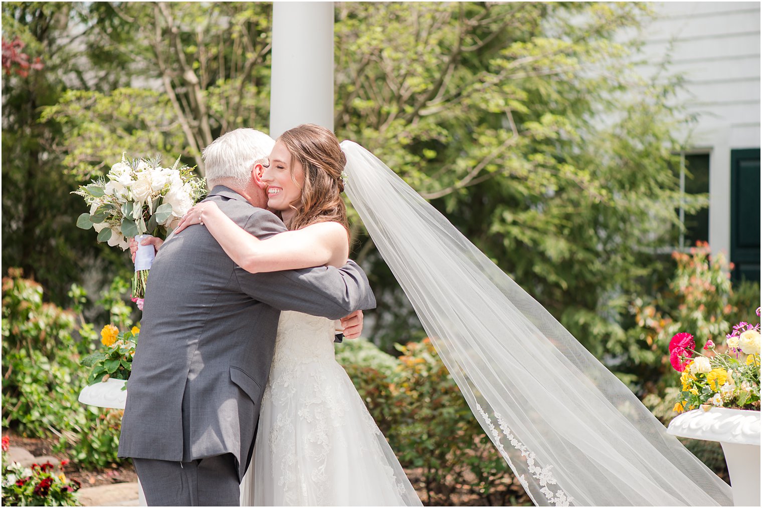 bride and dad hug during first look in Jersey 