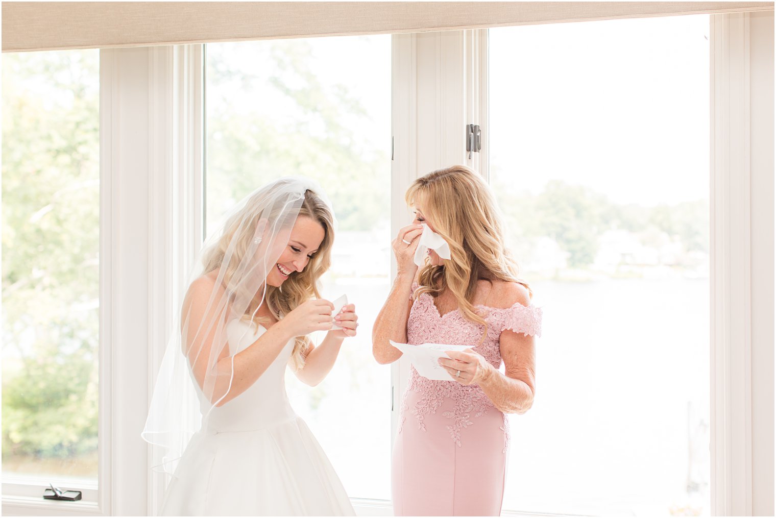 bride cries with mother while preparing for NJ wedding day