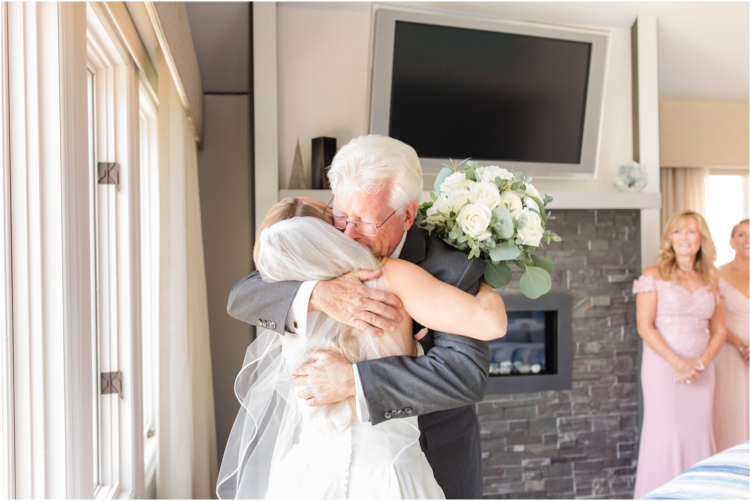bride and dad hug during first look on NJ wedding day