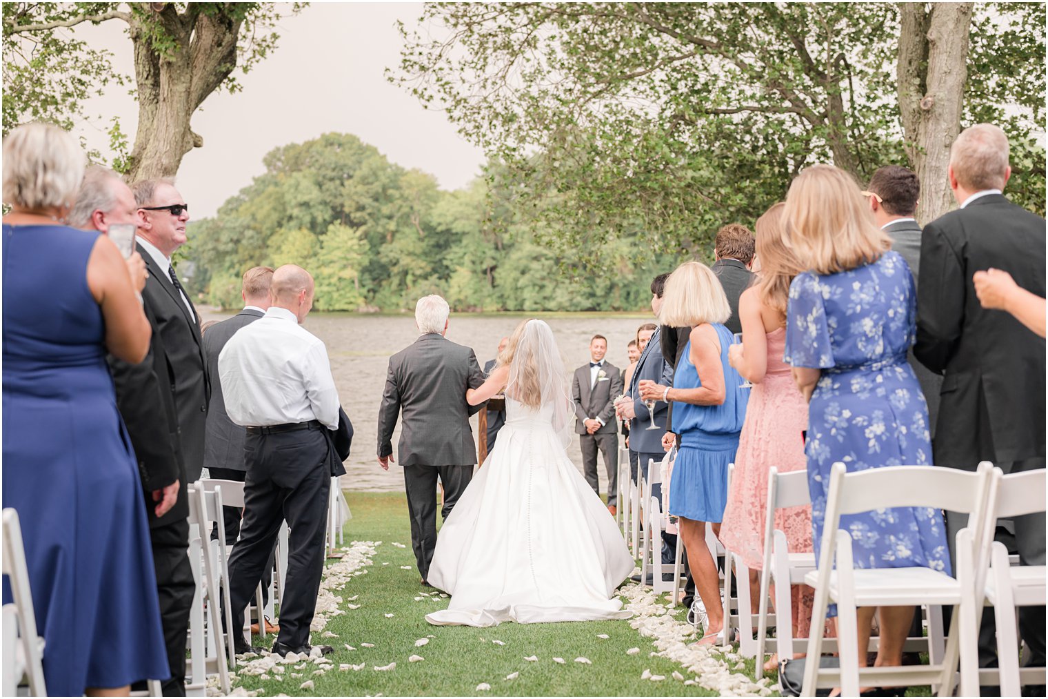 dad walks bride down aisle during outdoor wedding ceremony in Franklin Lakes