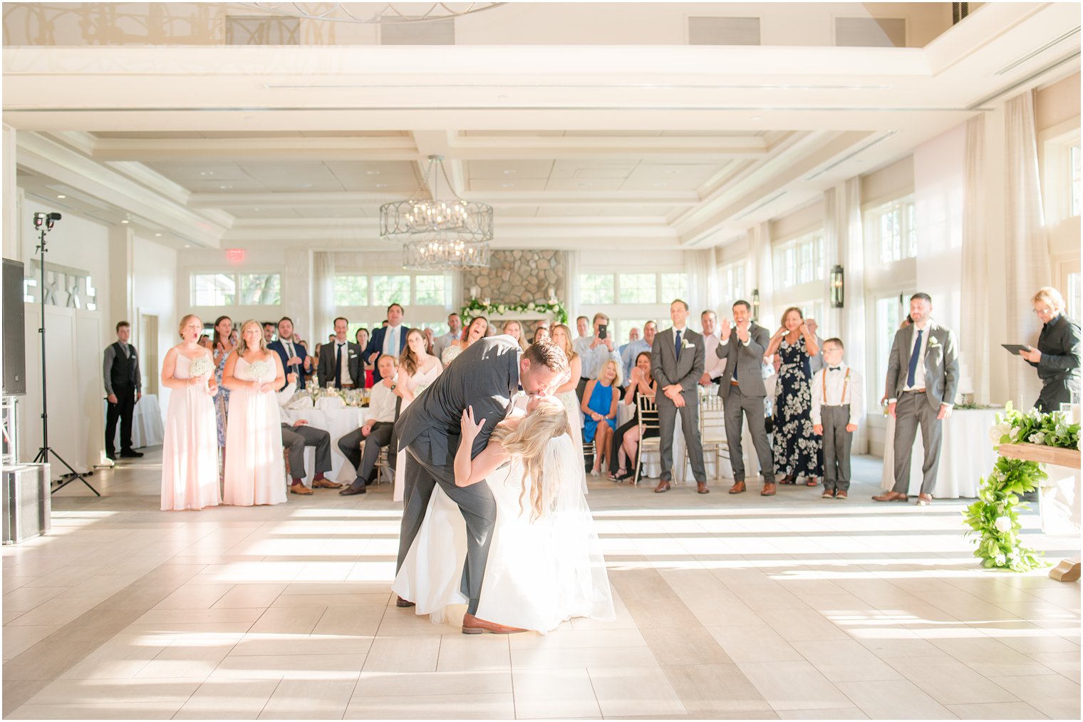 groom dips bride during first dance at New Jersey wedding reception