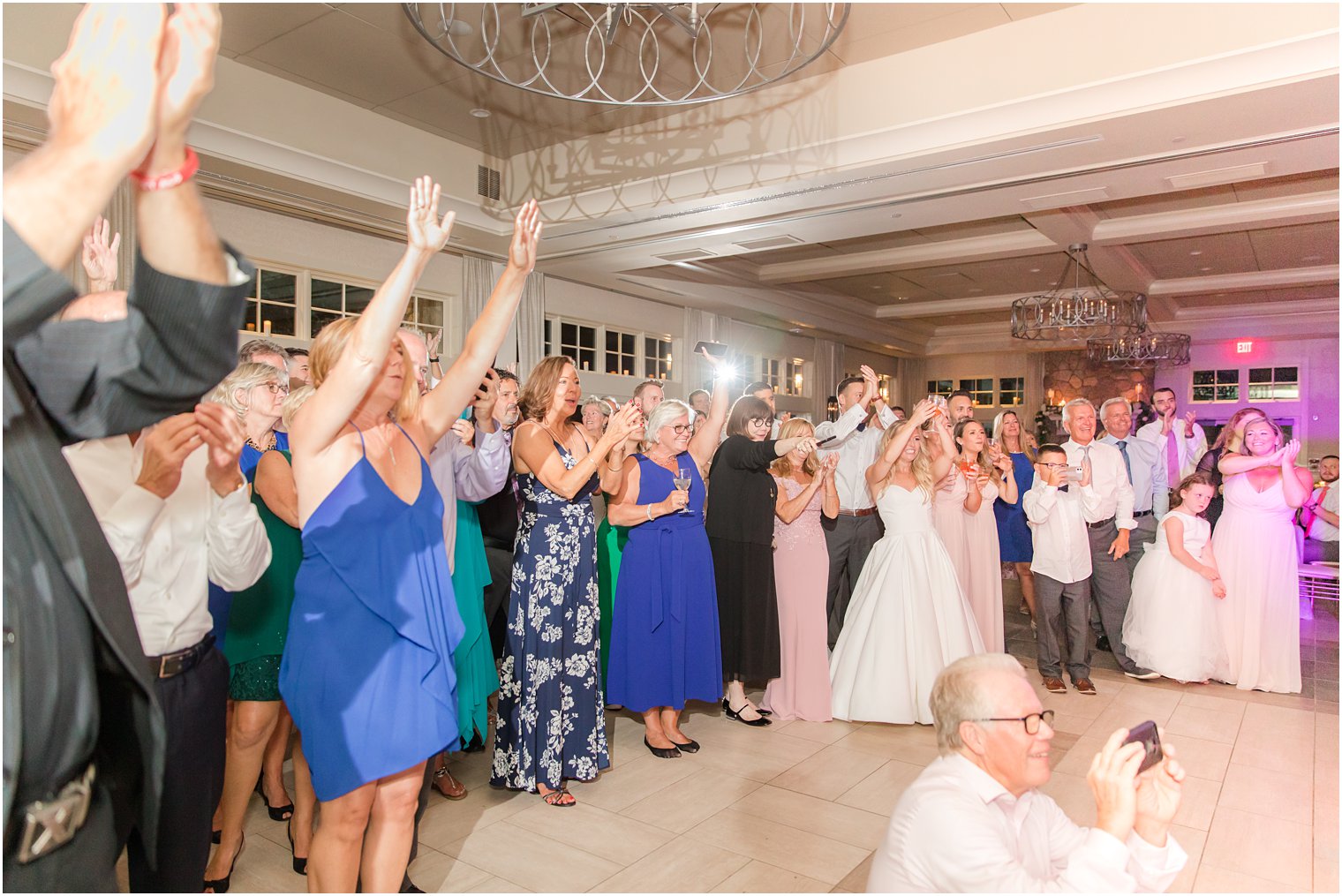 bride and groom dance to live band at New Jersey wedding reception