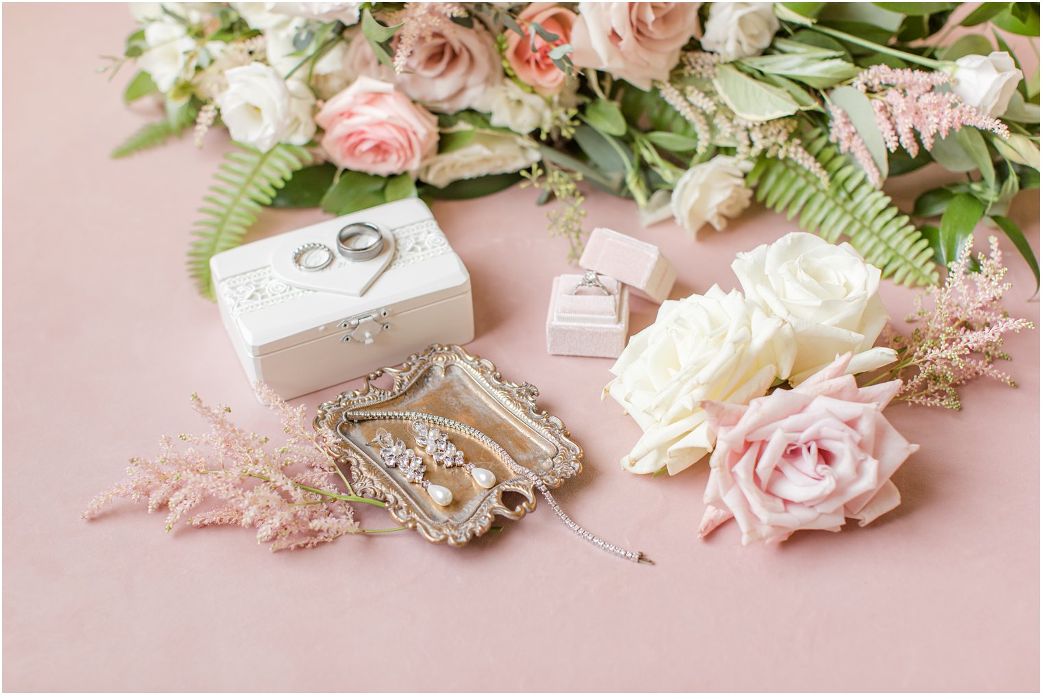 bride's jewelry on pink board for Ashford Estate wedding