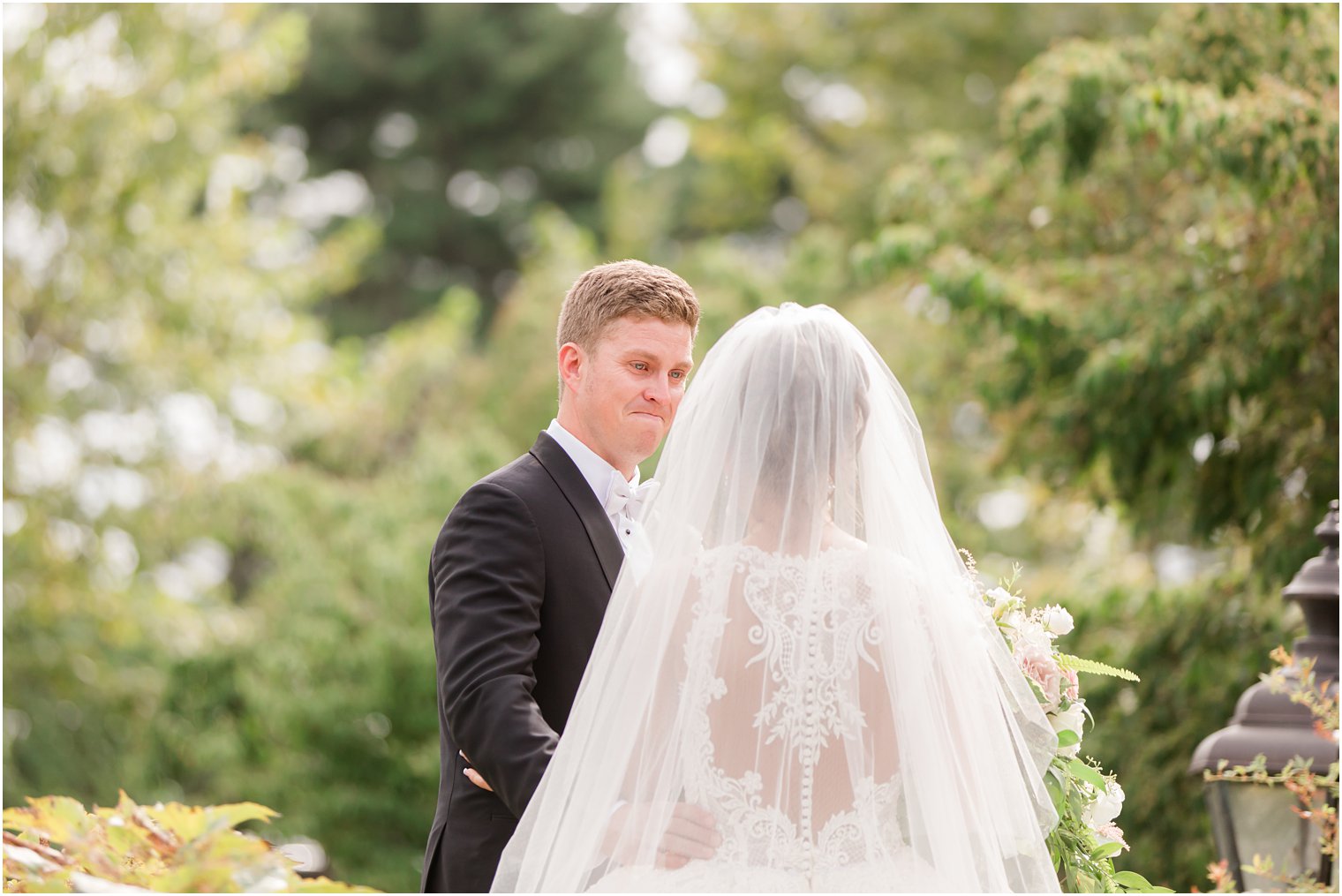 groom cries during first look on wedding day in New Jersey 