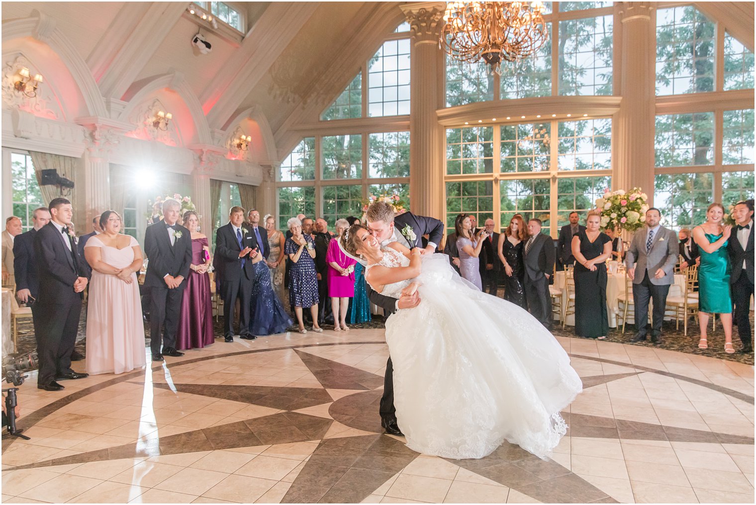 groom dips bride during first dance at Allentown NJ wedding reception