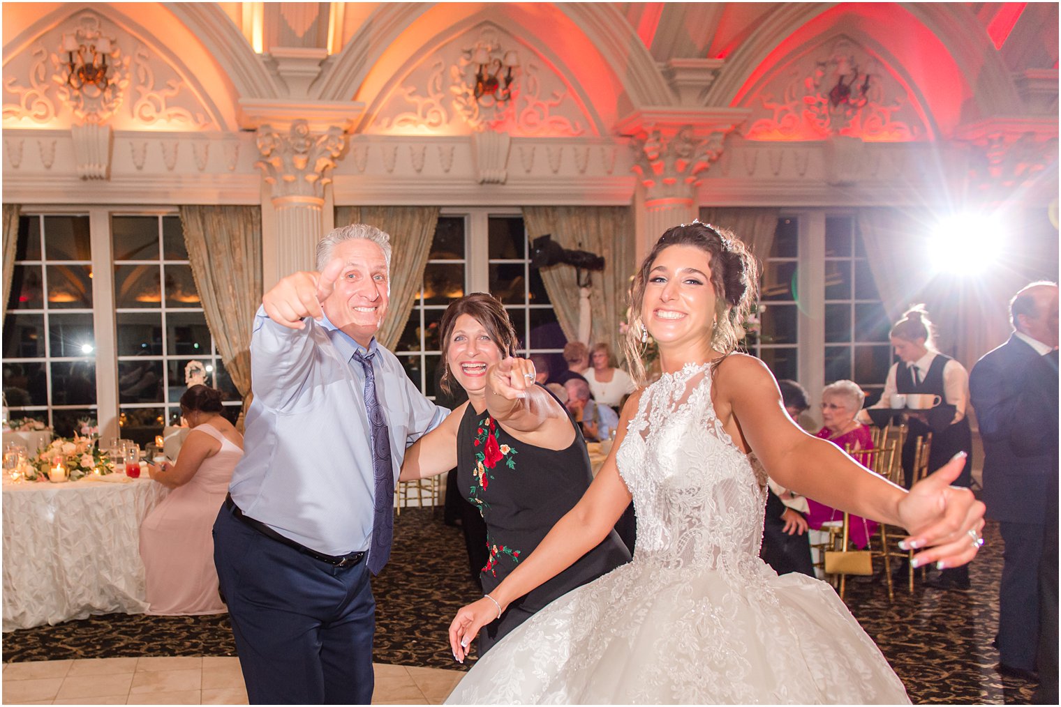 bride dances with parents during Allentown NJ wedding reception