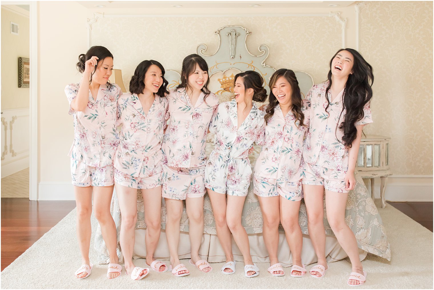 brie laughs with bridesmaids in matching floral pajamas before Ashford Estate wedding 
