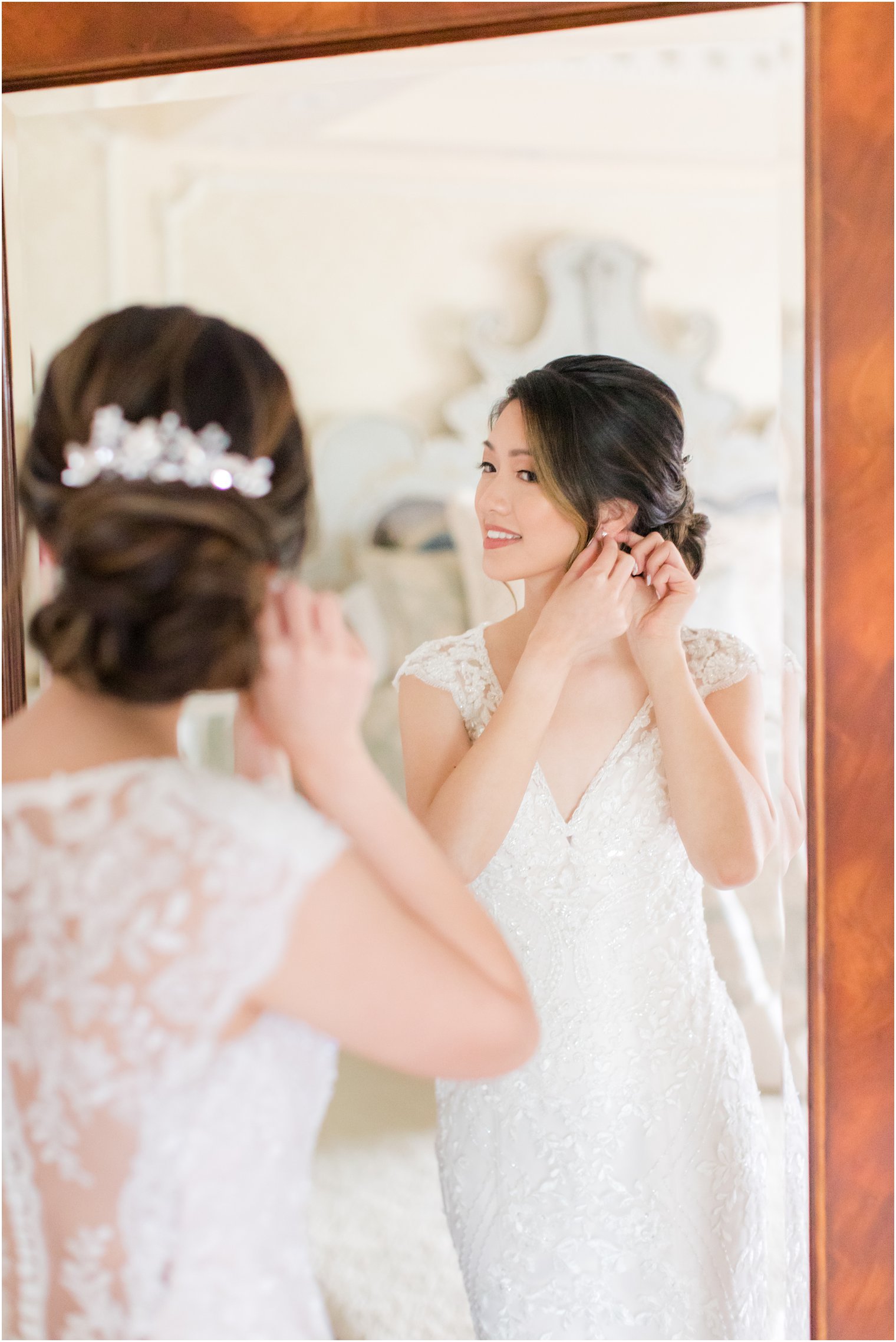bride adjusts earrings before Allentown NJ wedding