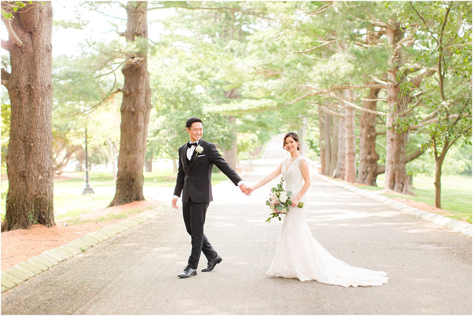 bride and groom walk on driveway at Ashford Estate