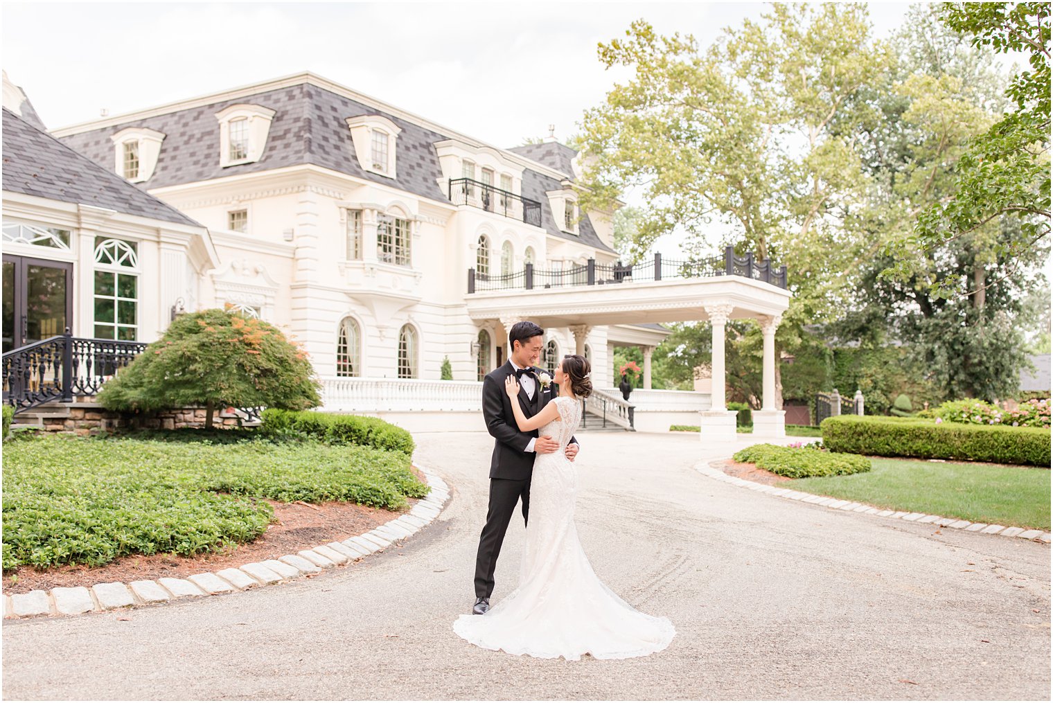 bride and groom pose outside Ashford Estate in Allentown NJ