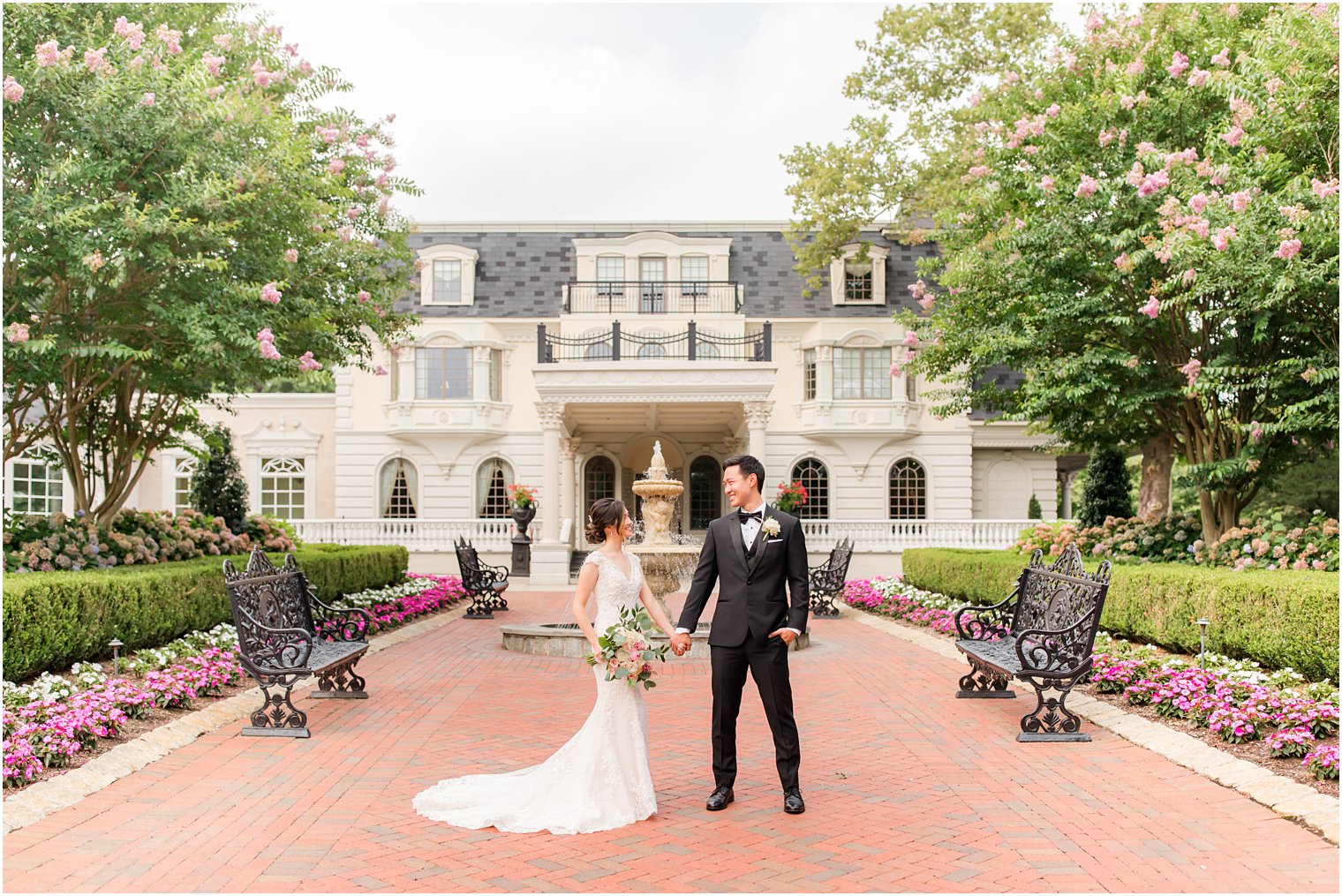 bride and groom hold hands on patio at Ashford Estate