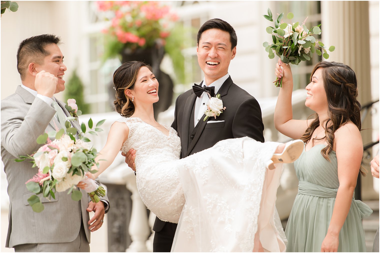 groom holds bride outside Ashford Estate