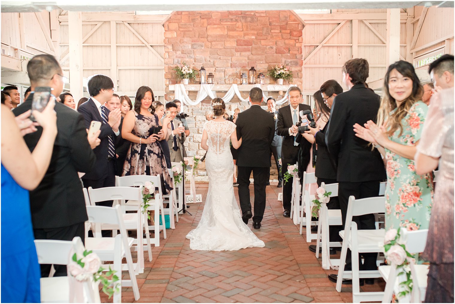 bride walks down aisle with dad during Ashford Estate wedding ceremony 