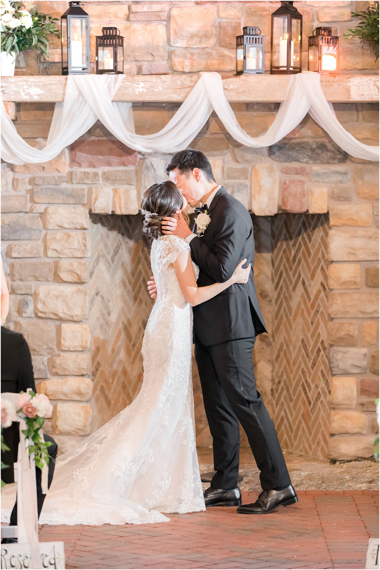 bride and groom kiss during Ashford Estate wedding ceremony 