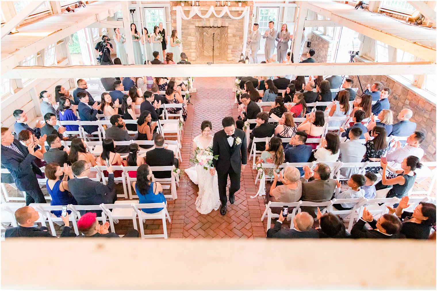 bride and groom walk down aisle after ceremony at Ashford Estate 