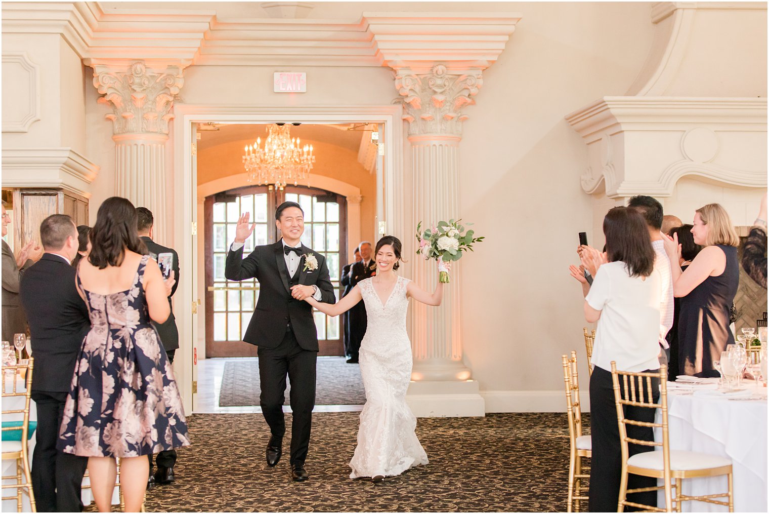 newlyweds enter wedding reception at Ashford Estate