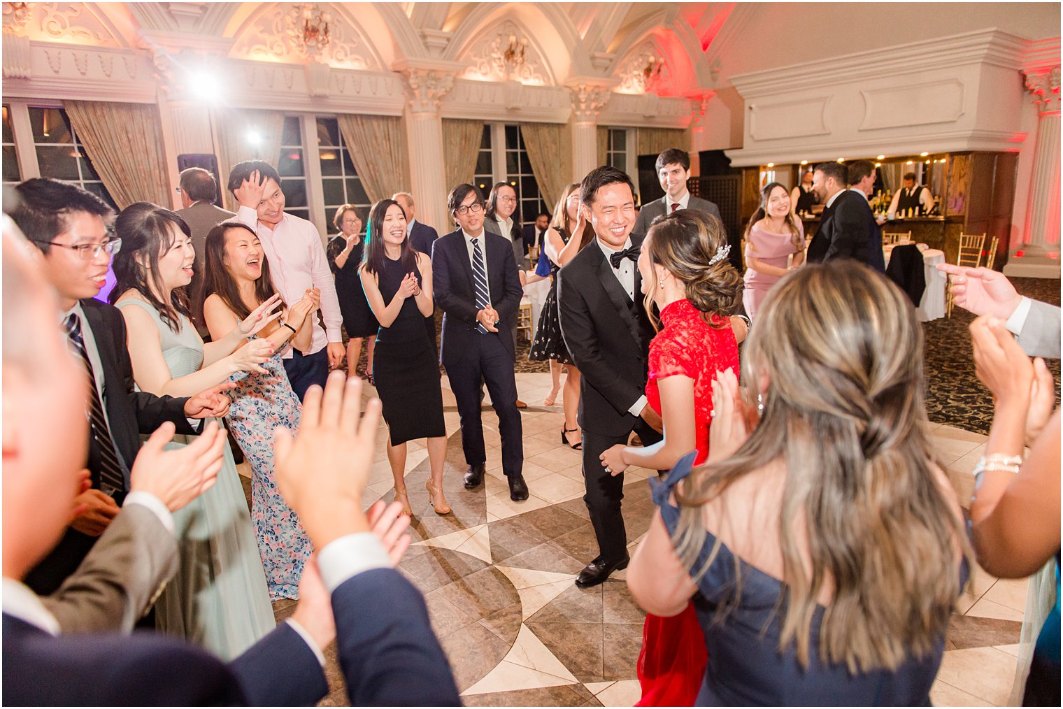 bride and groom dance with guests during Ashford Estate wedding reception