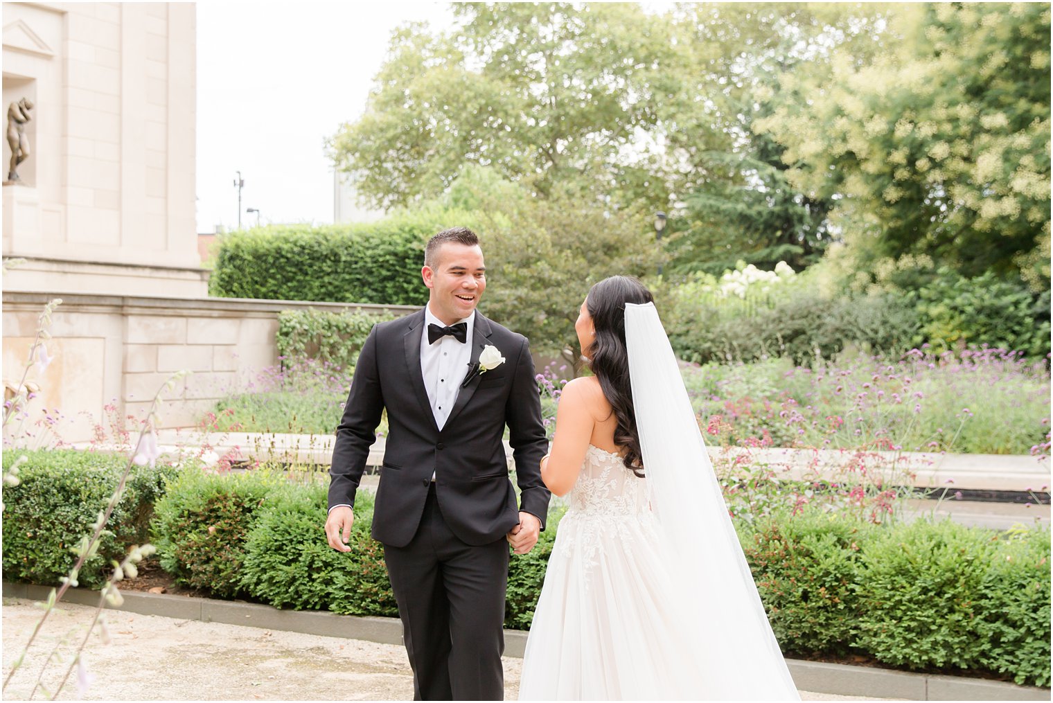 groom sees bride during first look at Rodin Museum