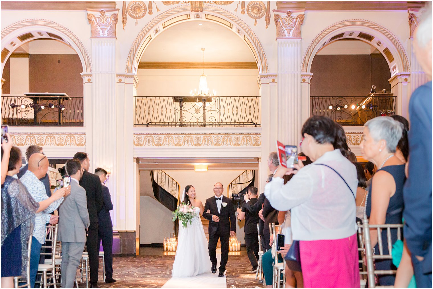 bride and dad walk into wedding ceremony in Philly PA