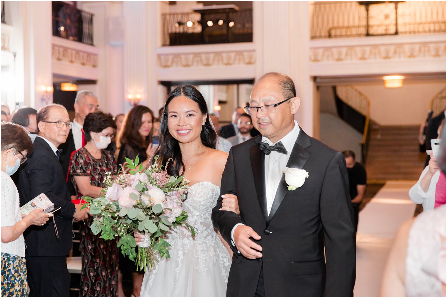 dad walks bride down aisle during Ballroom at the Ben wedding ceremony