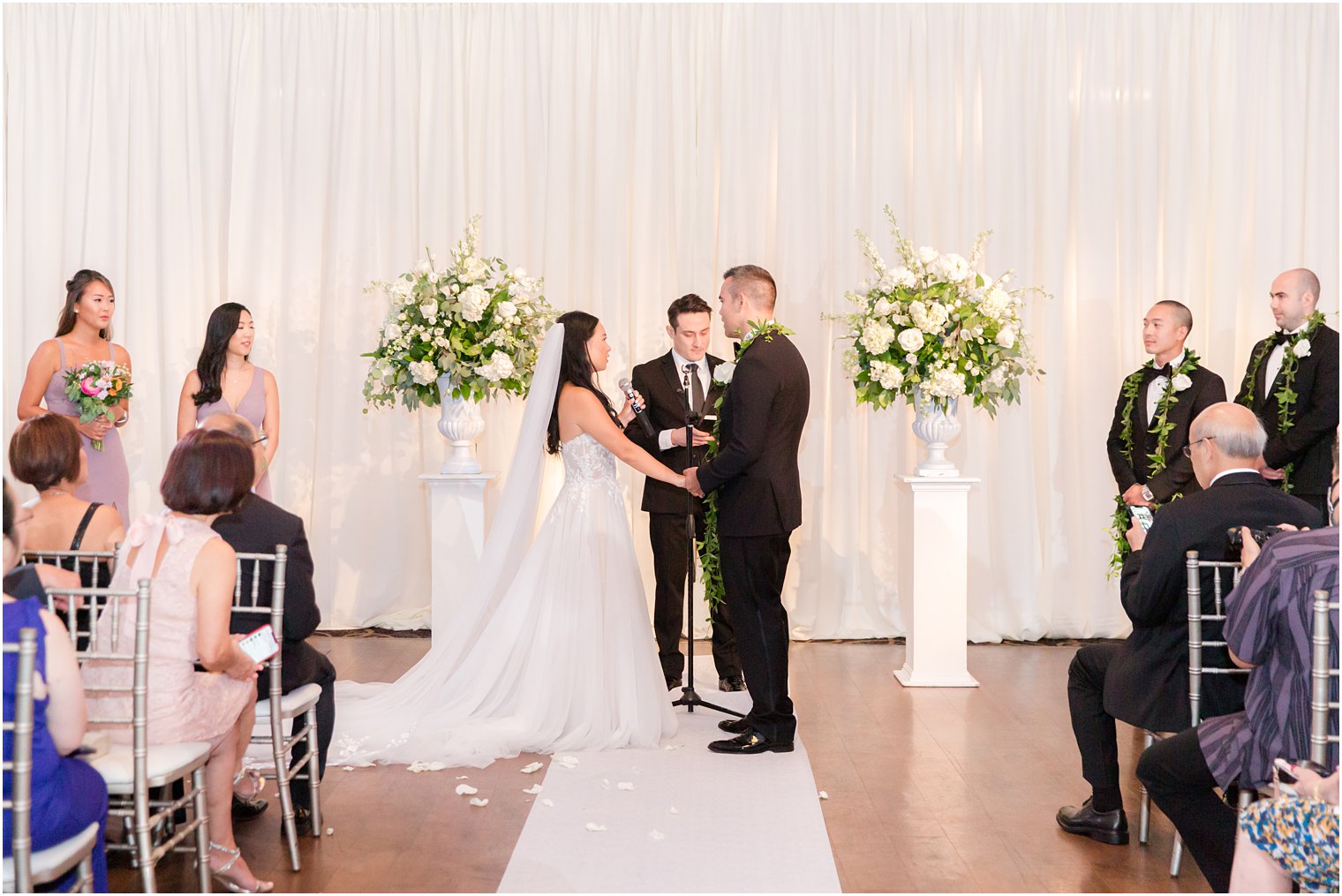 newlyweds exchange vows during Ballroom at the Ben wedding ceremony