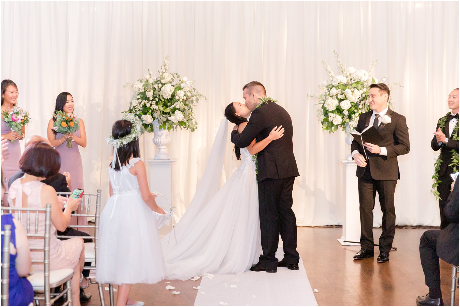 groom kisses bride during PA wedding ceremony