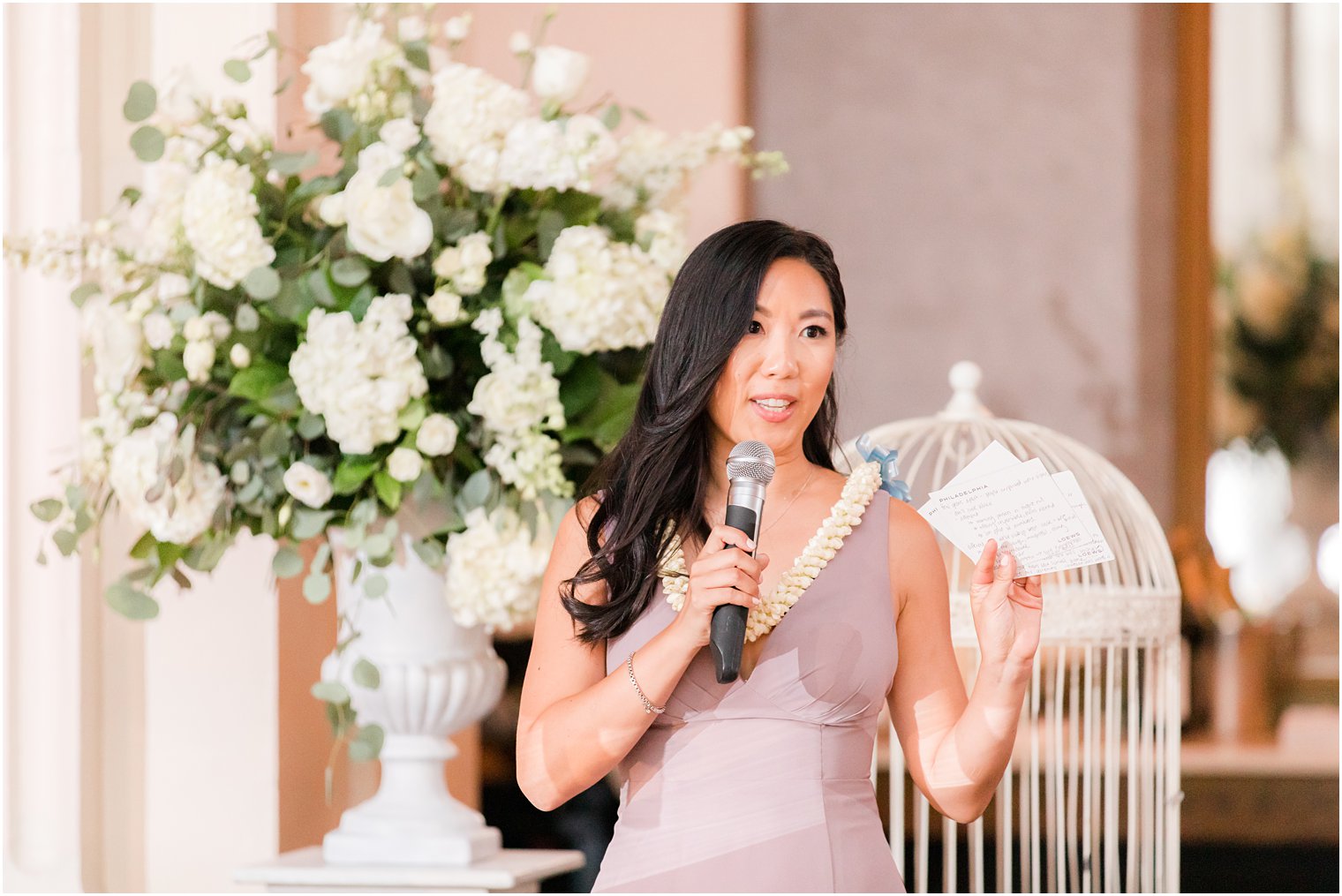 bridesmaid reads speech during Philly PA wedding reception