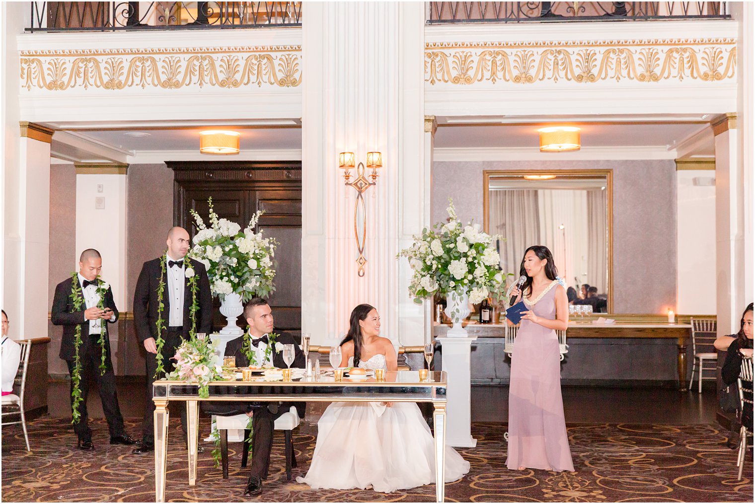 MOH in pink dress gives speech to bride during Philly PA wedding reception