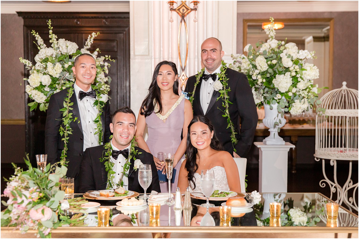 newlyweds pose with family during Philly PA wedding reception