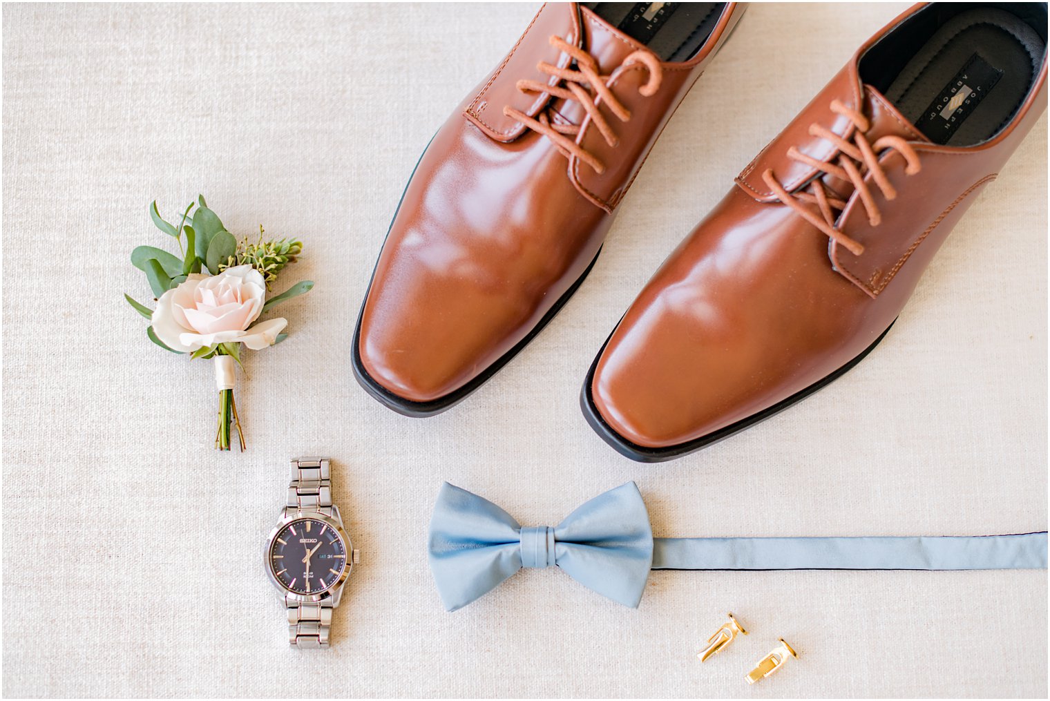 groom's brown shoes and blue bow tie for Bonnet Island Estate wedding