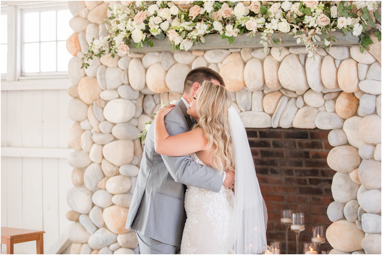 bride and groom hug during first look on NJ wedding day