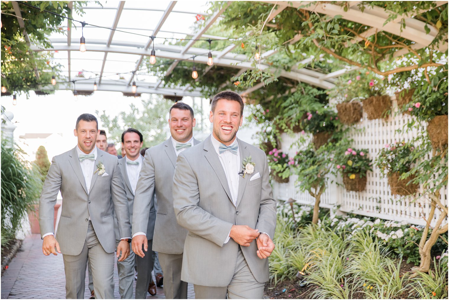 groom walks into wedding ceremony in Manahawkin NJ with groomsmen