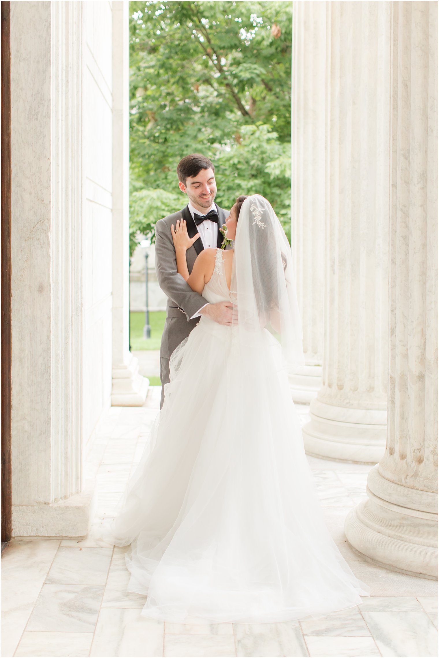 bride and groom hug at Princeton University