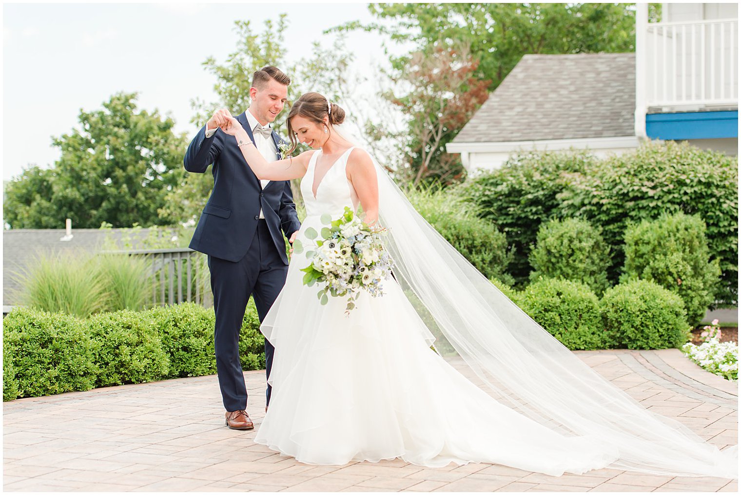 groom twirls bride during first look in Point Pleasant NJ