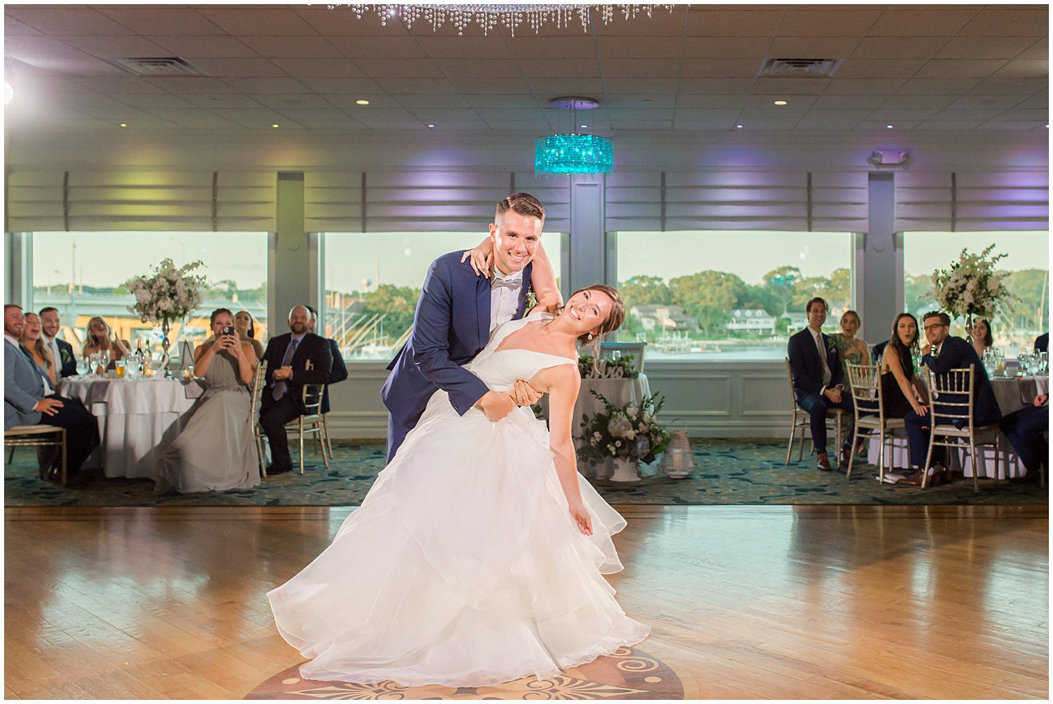 groom dips bride during reception in Point Pleasant NJ