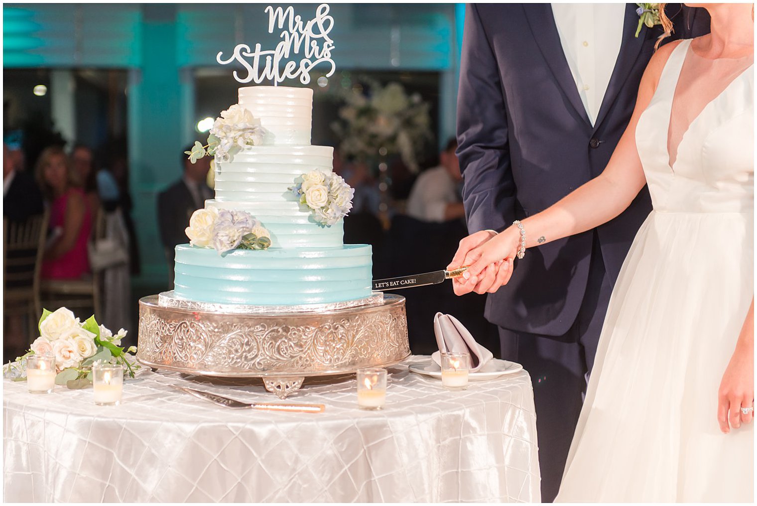 newlyweds cut wedding cake at NJ wedding reception