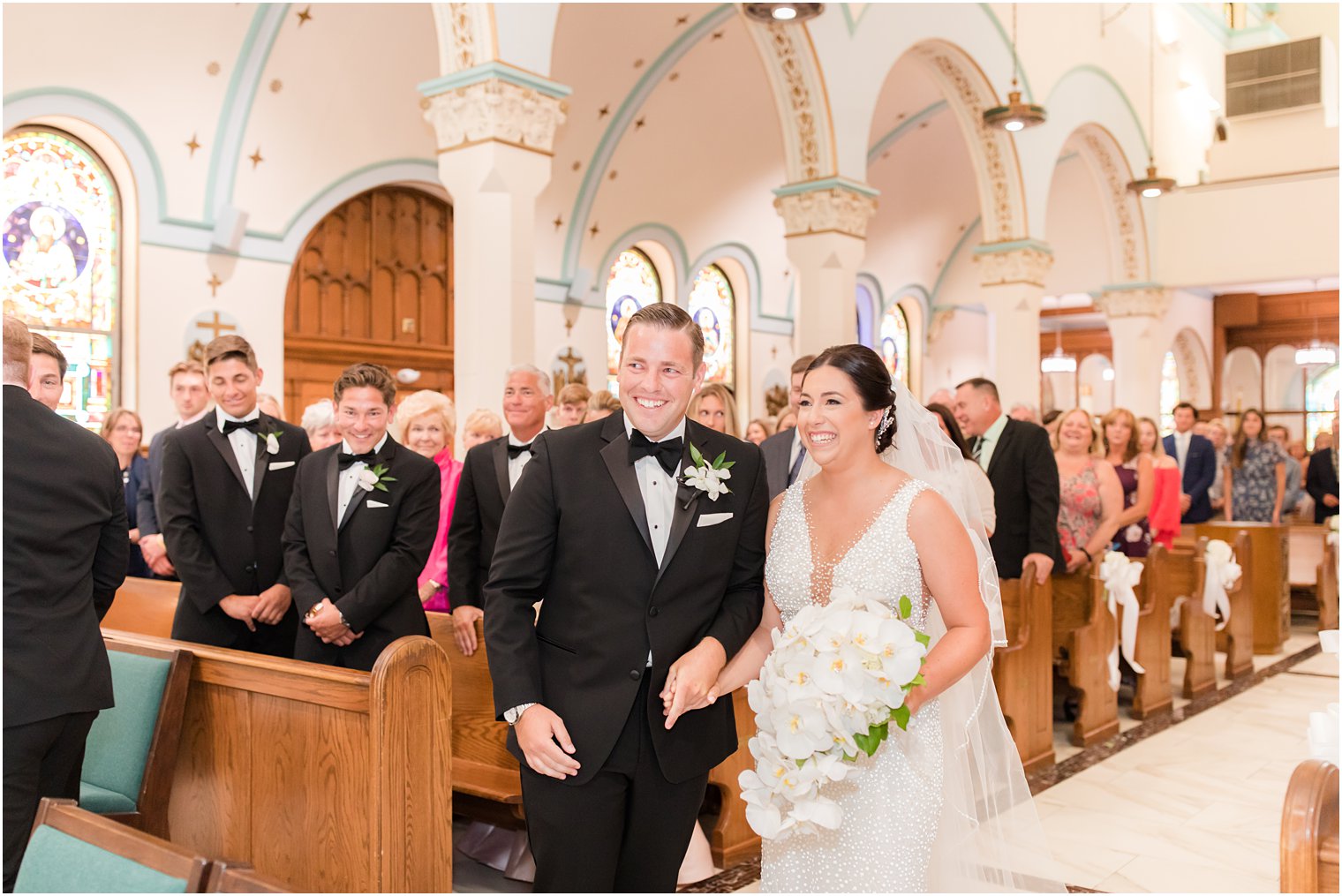 groom and bride meet during traditional wedding ceremony at St. James church