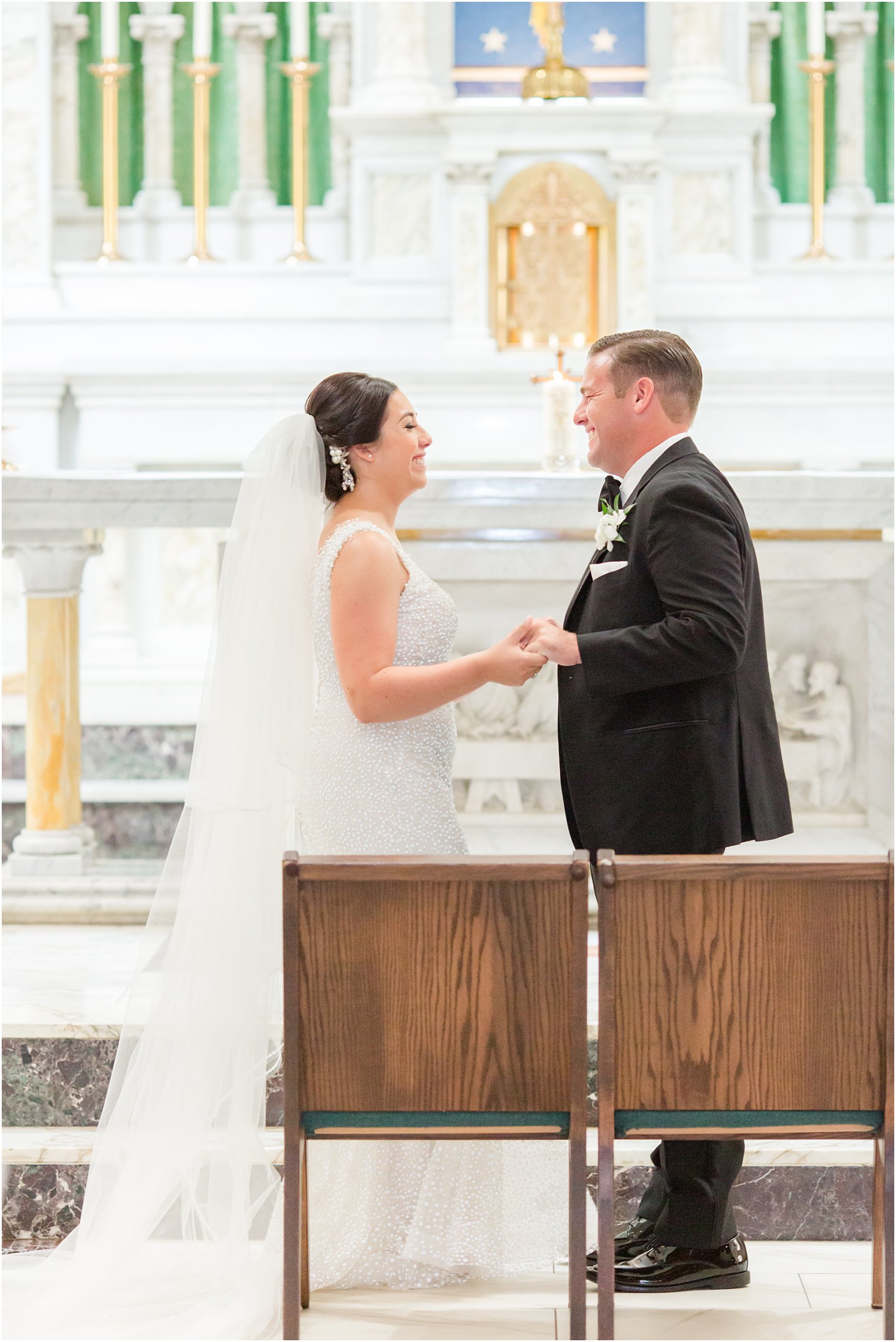 bride and groom smile after church ceremony