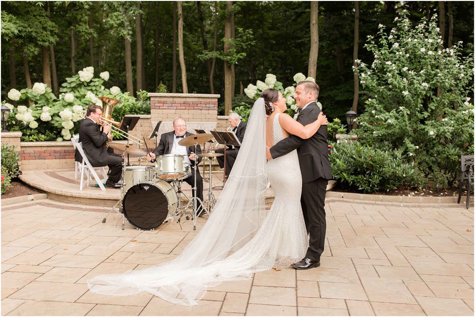 newlyweds dance with live band playing photographed by Ocean Township NJ wedding photographer Idalia Photography