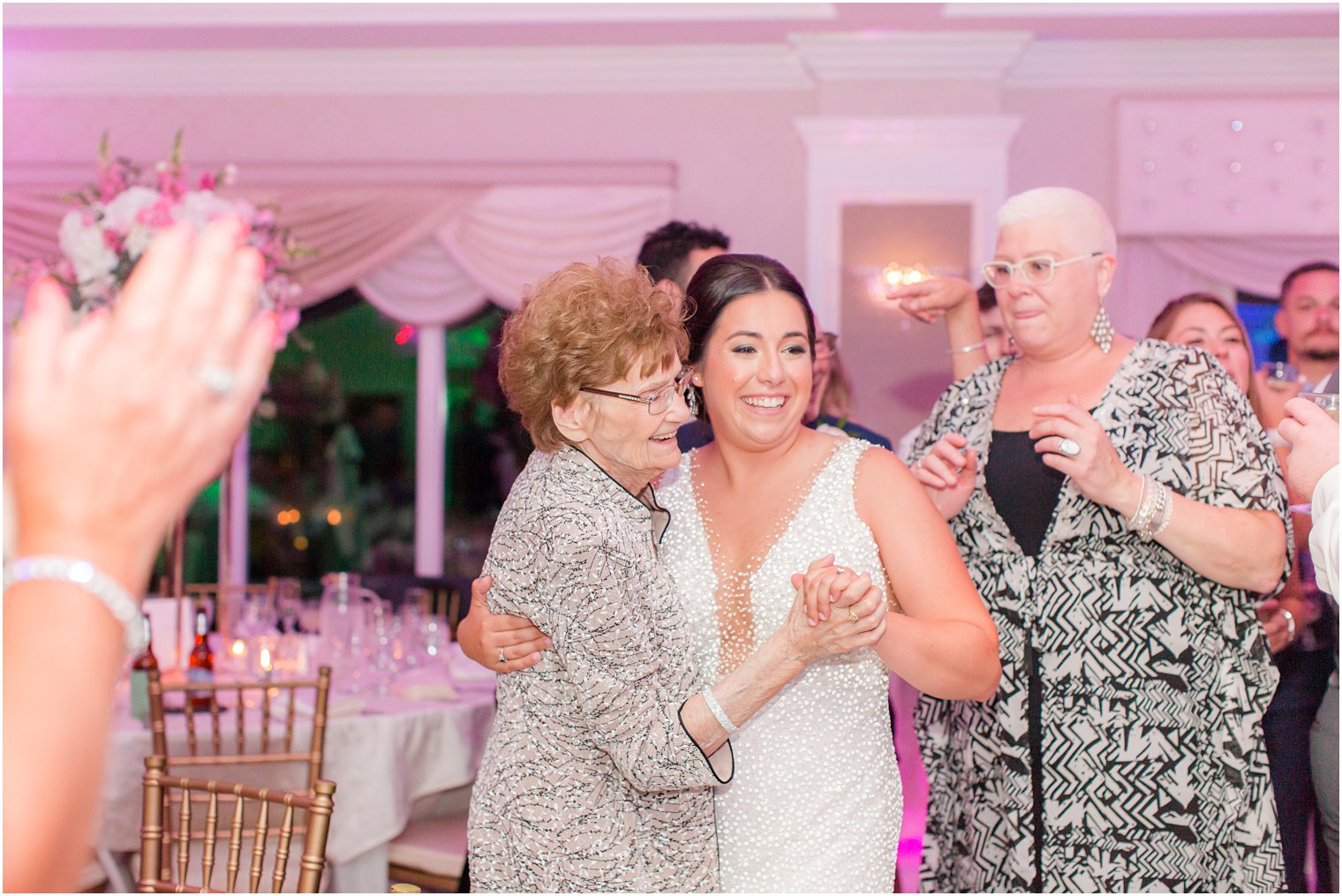 bride and grandmother dance during NJ wedding reception 
