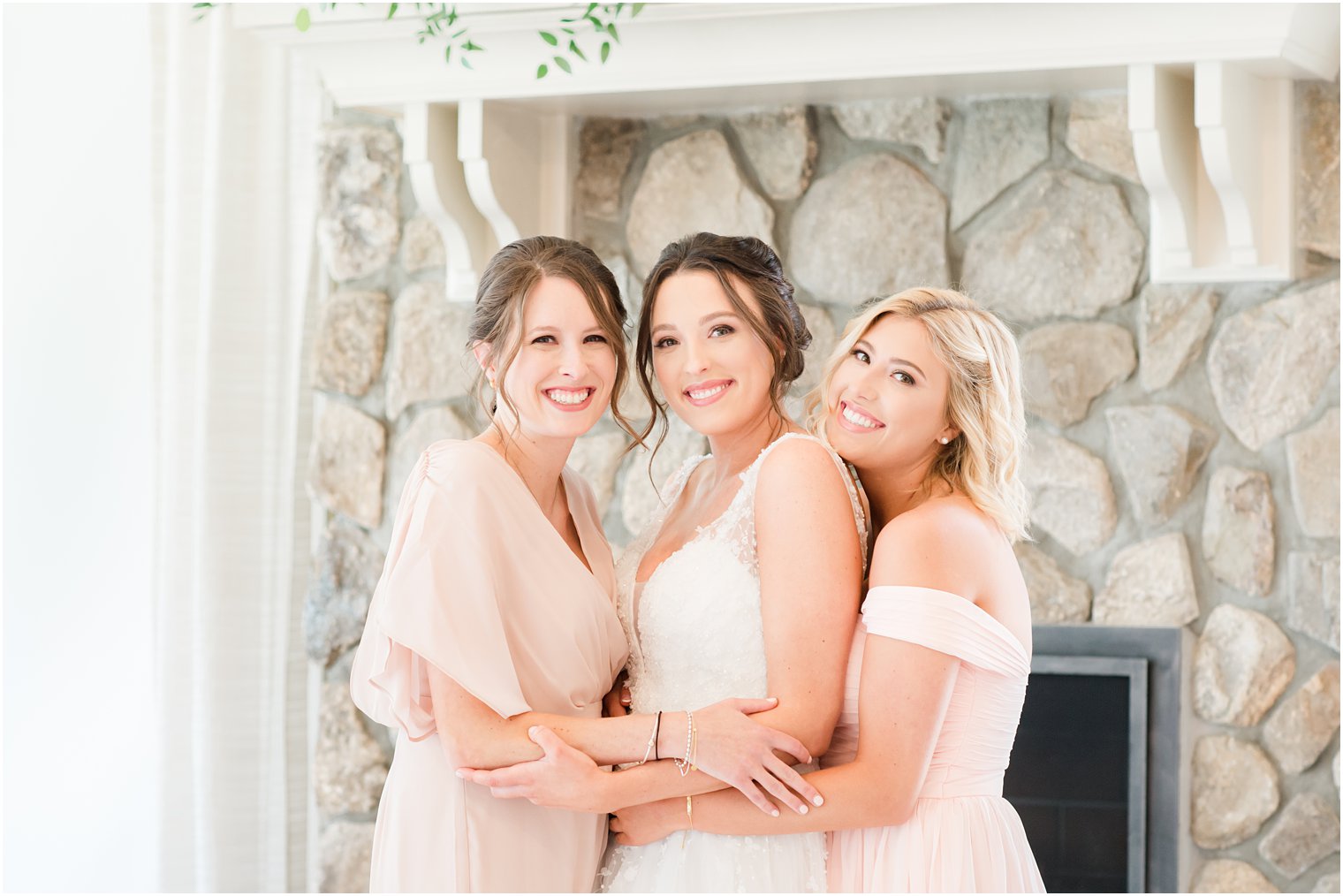 bridesmaids hug bride before NJ wedding day