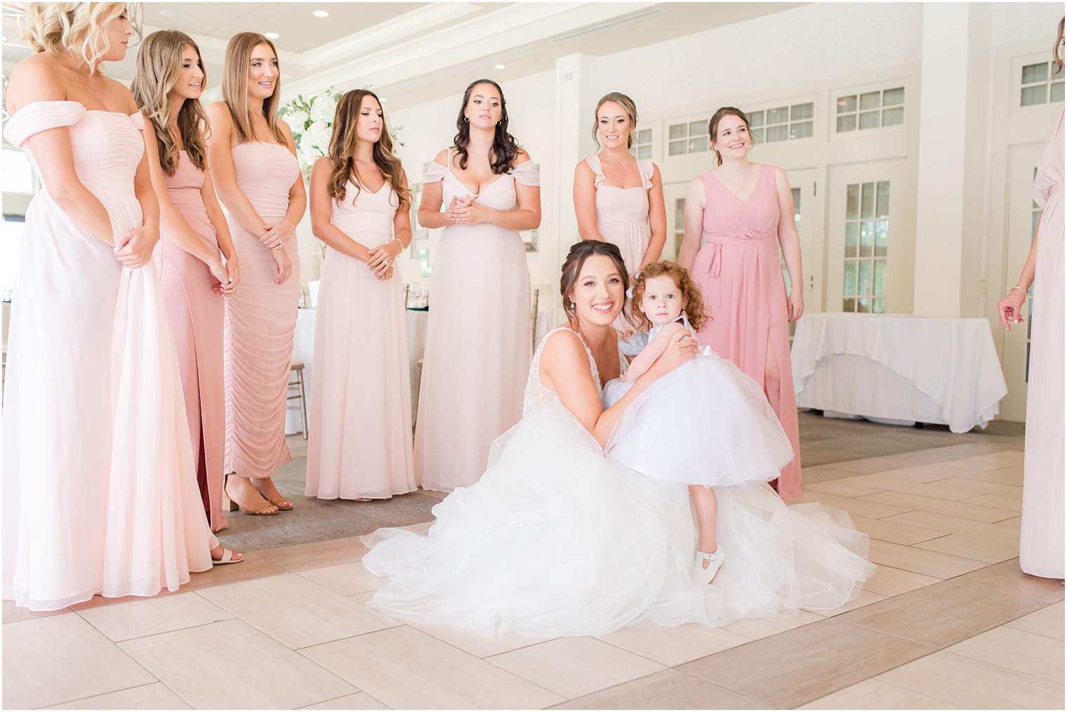 bride poses with flower girl at Indian Trail Club