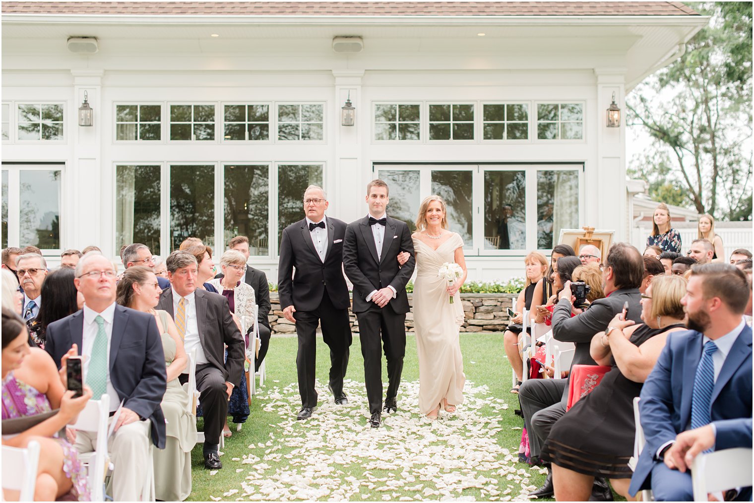 groom walks down aisle with parents for NJ wedding ceremony 