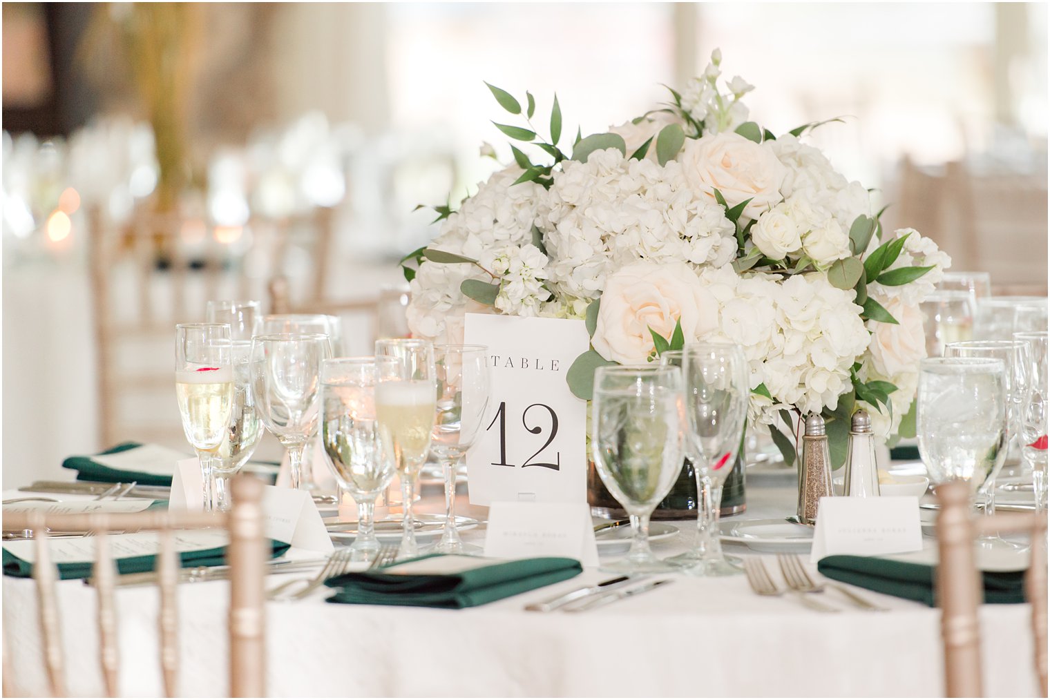 ivory floral centerpieces for Indian Trail Club wedding reception 