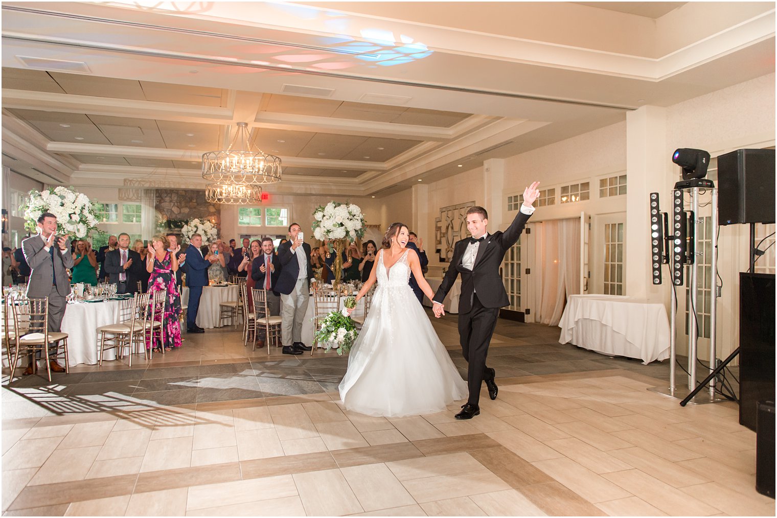 bride and groom walk into Franklin Lakes NJ wedding reception