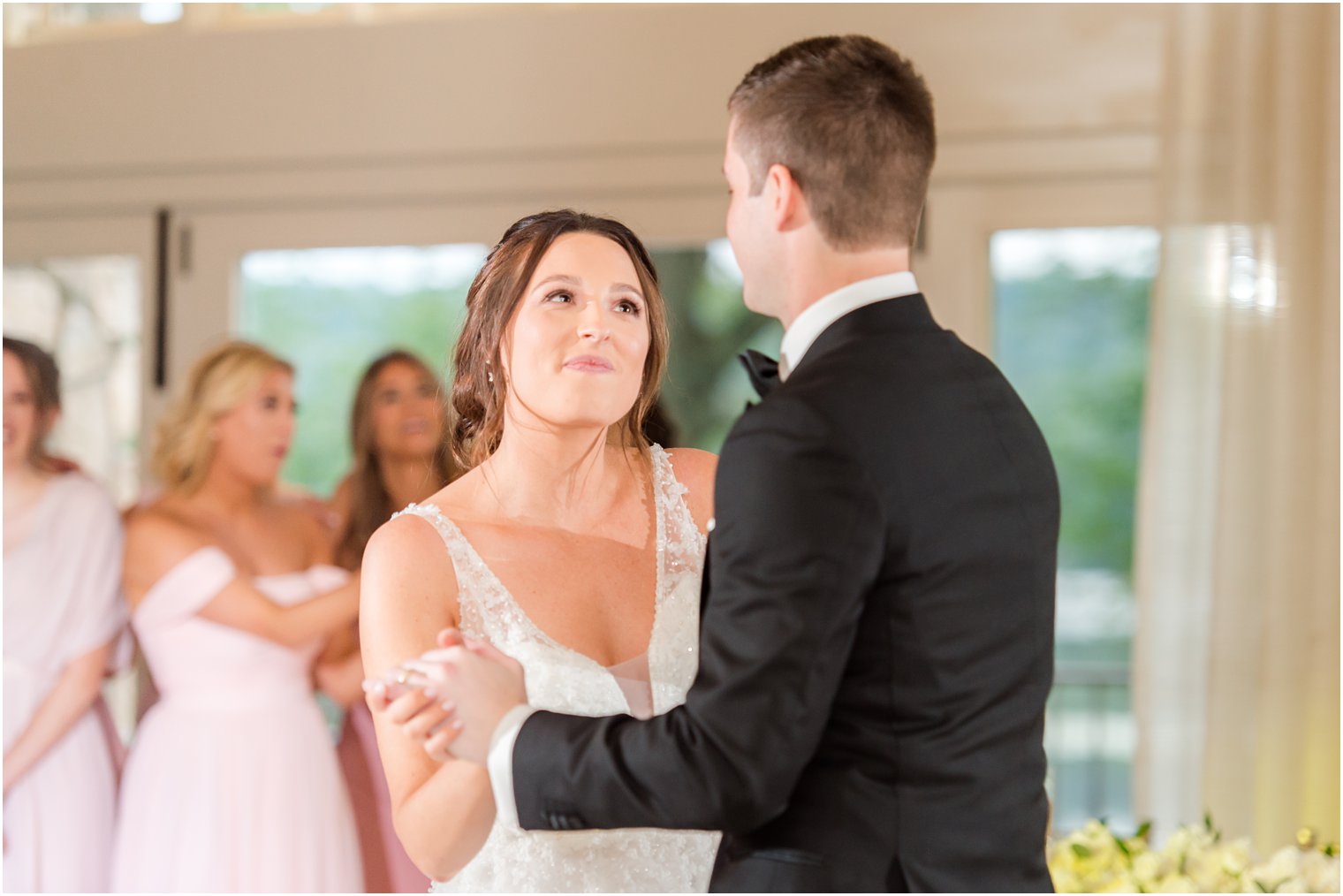 bride smiles at groom during Franklin Lakes NJ wedding reception