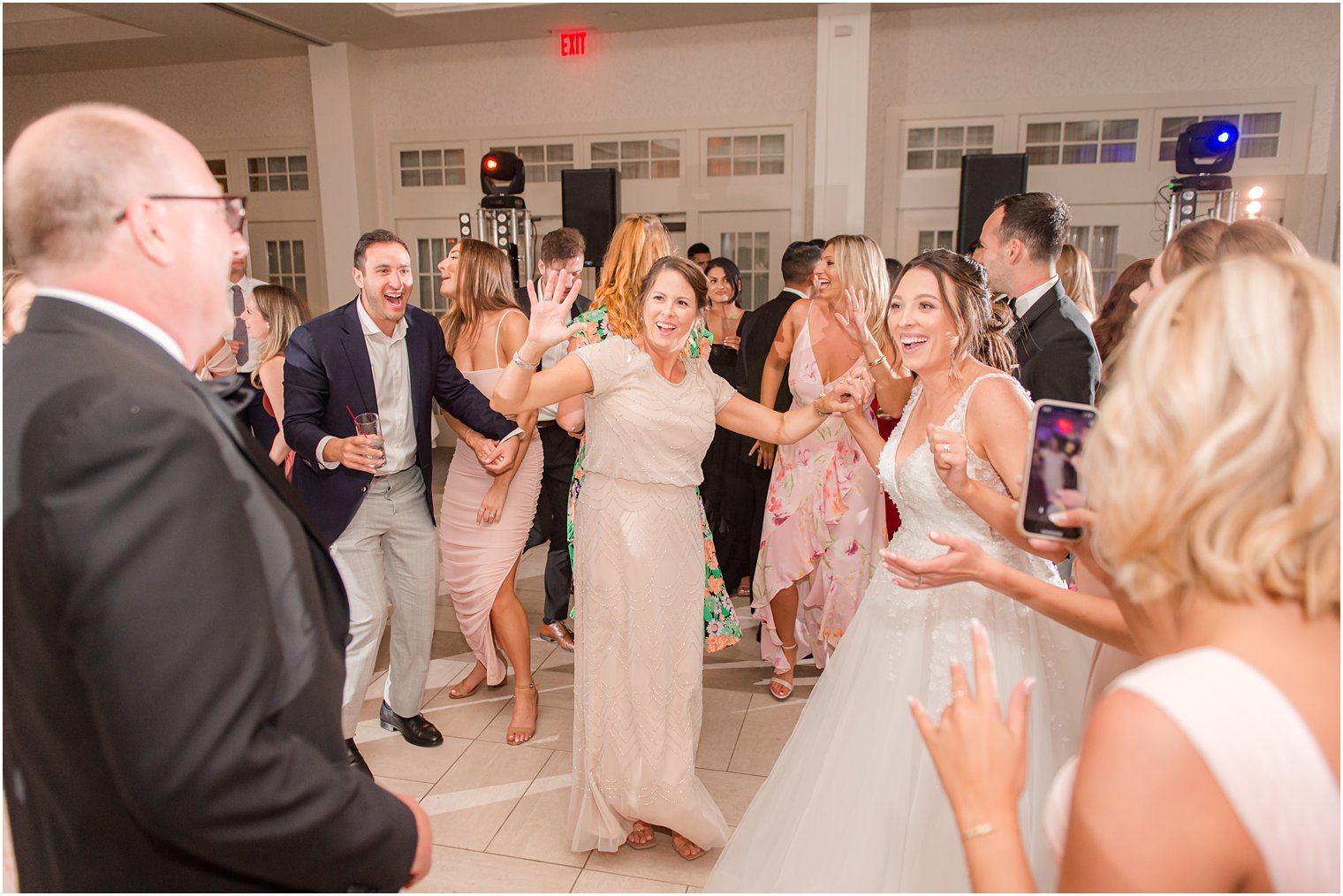 bride dances with family during Franklin Lakes NJ wedding reception