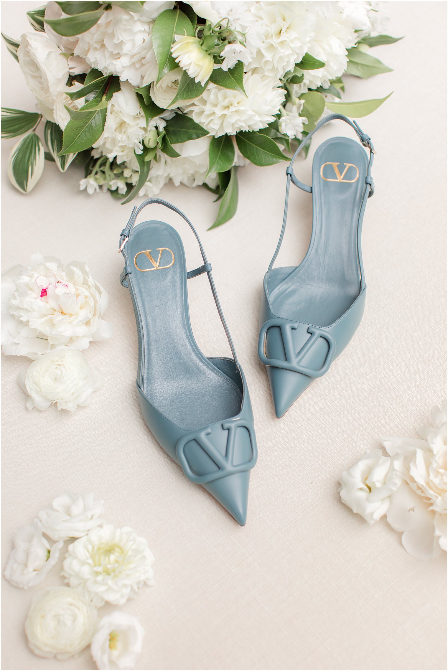 bride's blue shoes for microwedding at Ninety Acres